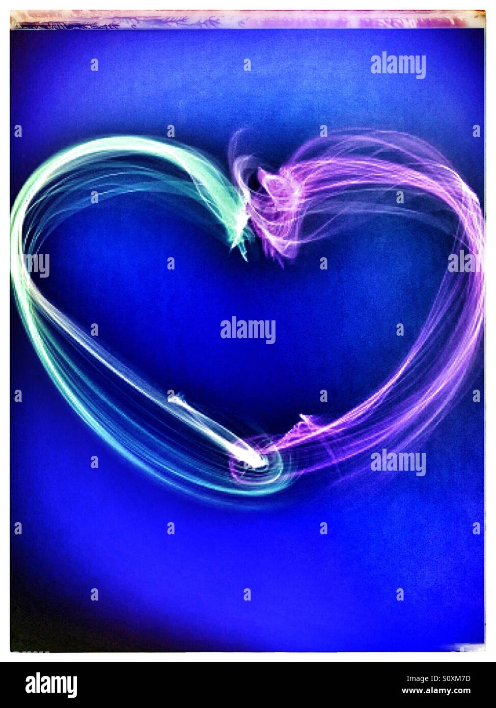 Light ray heart with Polaroid border Stock Photo - Alamy