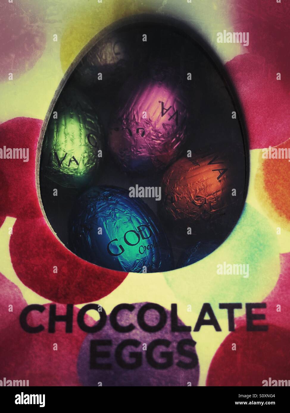 Chocolate Easter Eggs with abbreviated label showing word God - Smartphone Captured Stock Image