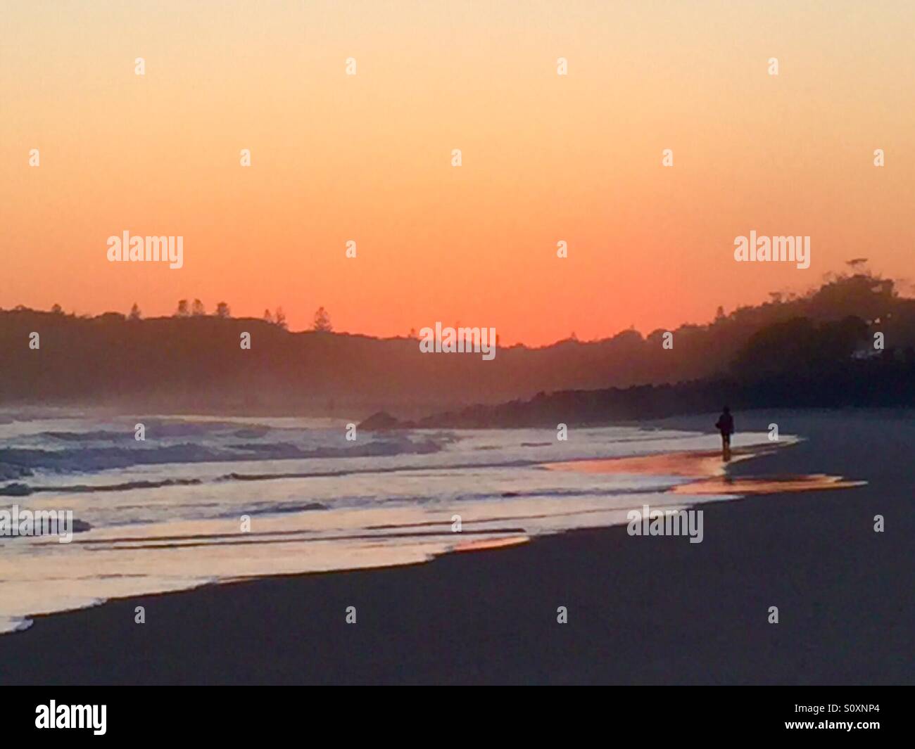 Sunrise strolling on the beach - Smartphone Captured Stock Image