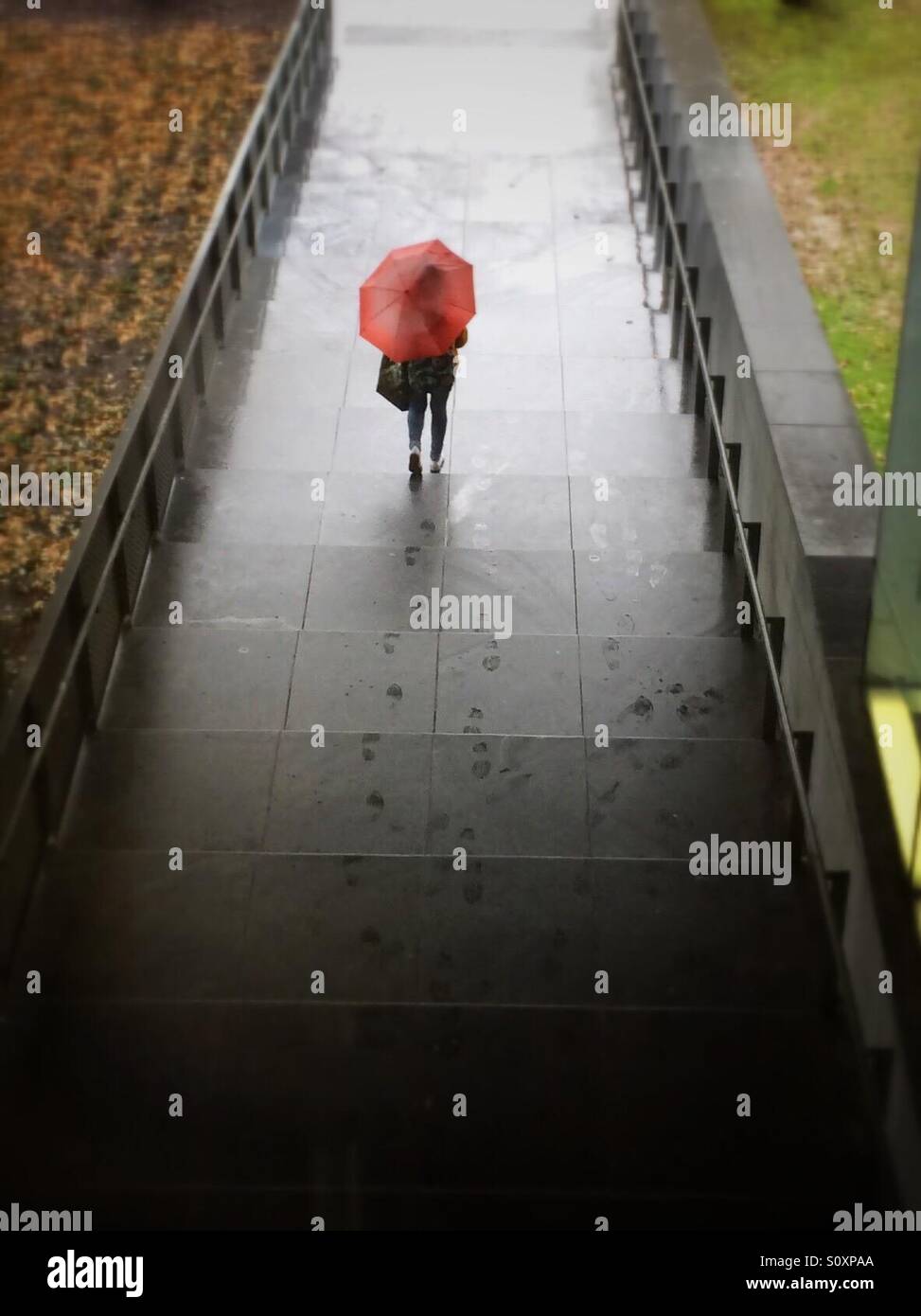 Umbrella walker Stock Photo