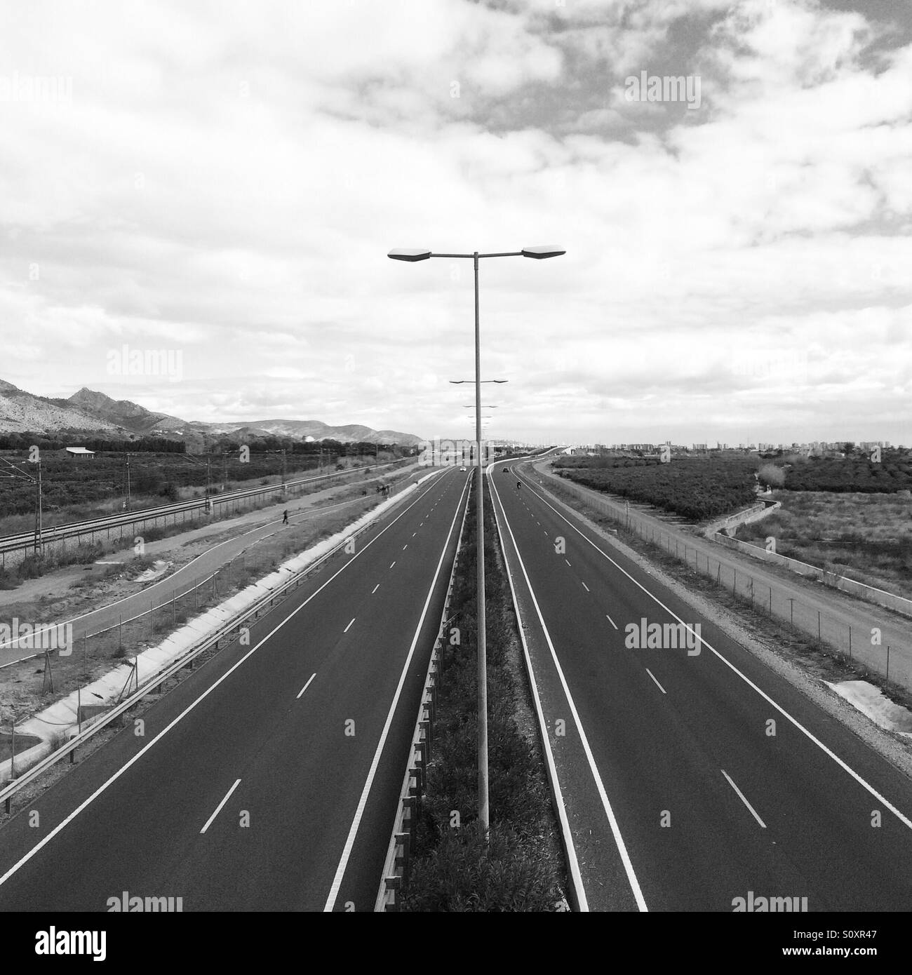 Empty highway in black and white Stock Photo