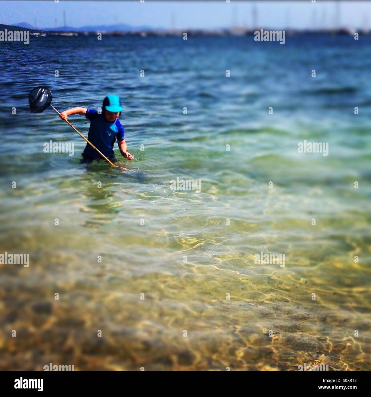 Fishing net exploring, Puerto Pollensa, Mallorca - Smartphone Captured Stock Image