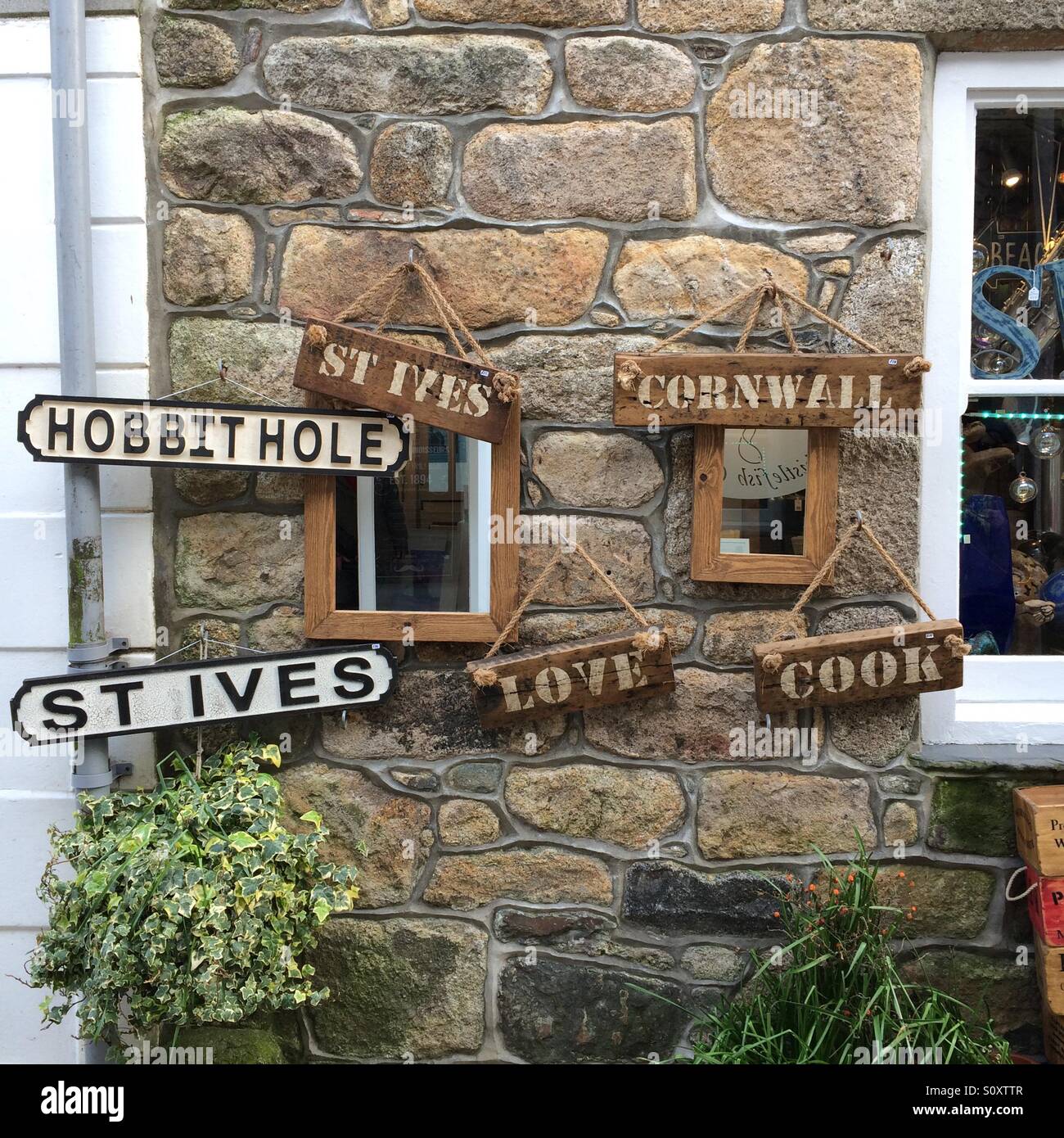 Signs outside a St Ives shop, Cornwall. - Smartphone Captured Stock Image