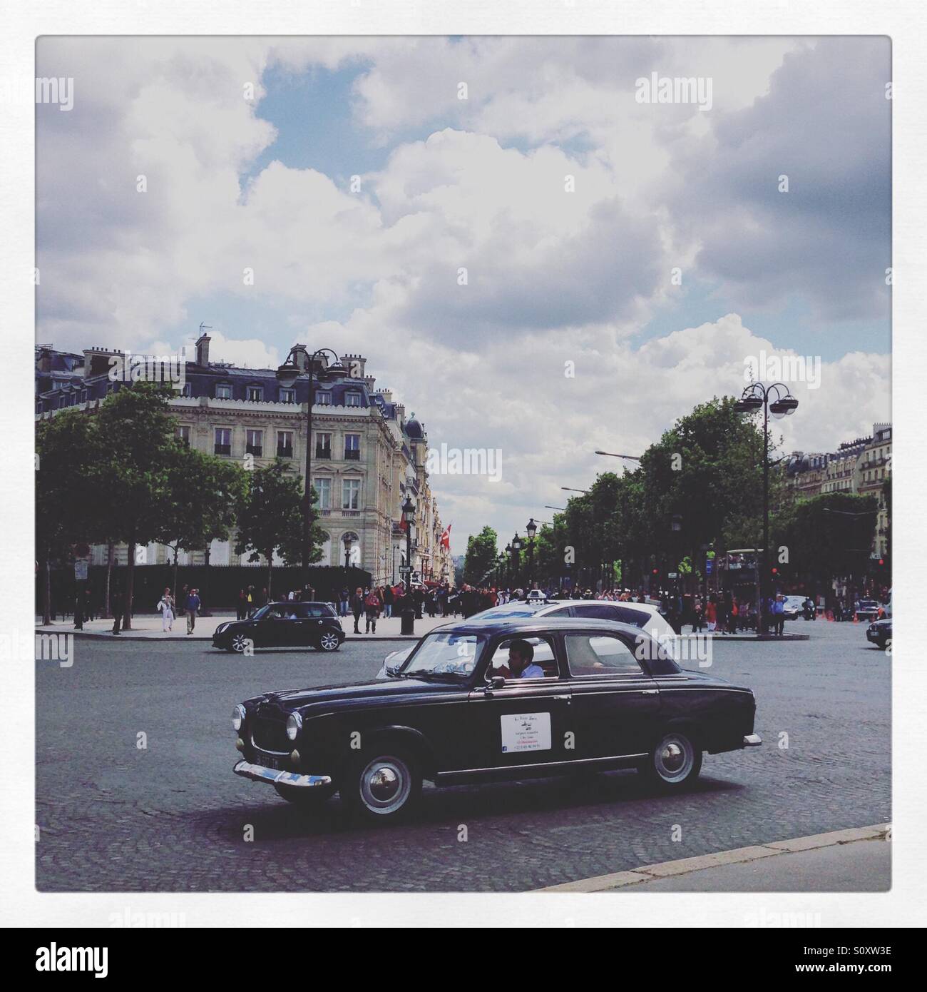 Place Charles de Gaulle, vintage car, Paris - Smartphone Captured Stock Image