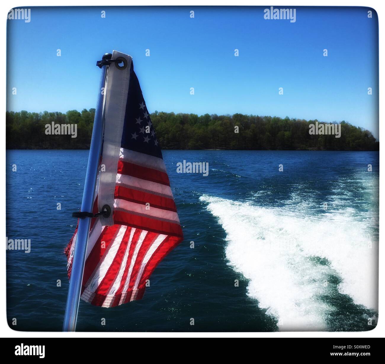 American flag on the water Stock Photo