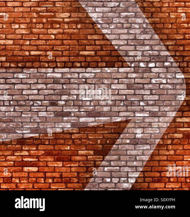 Arrow on brick wall - Smartphone Captured Stock Image