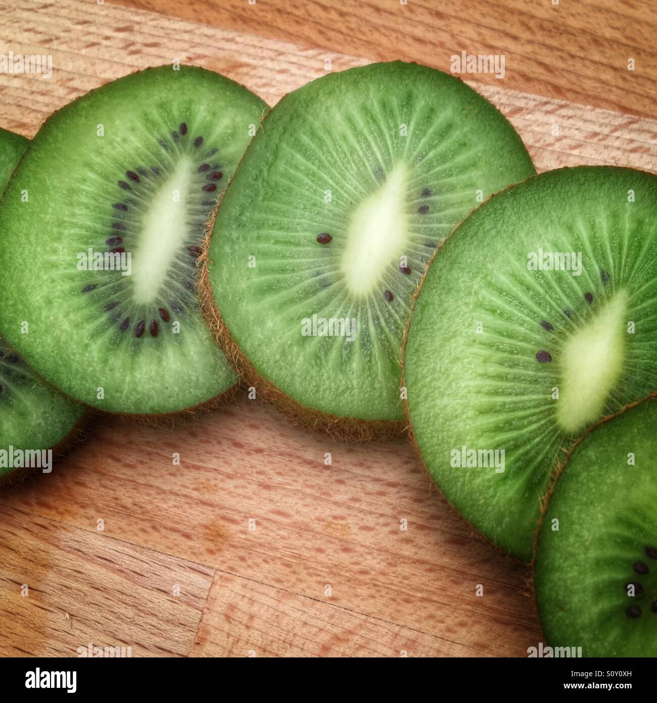 Freshly cut sliced of fresh green Kiwi fruit Stock Photo