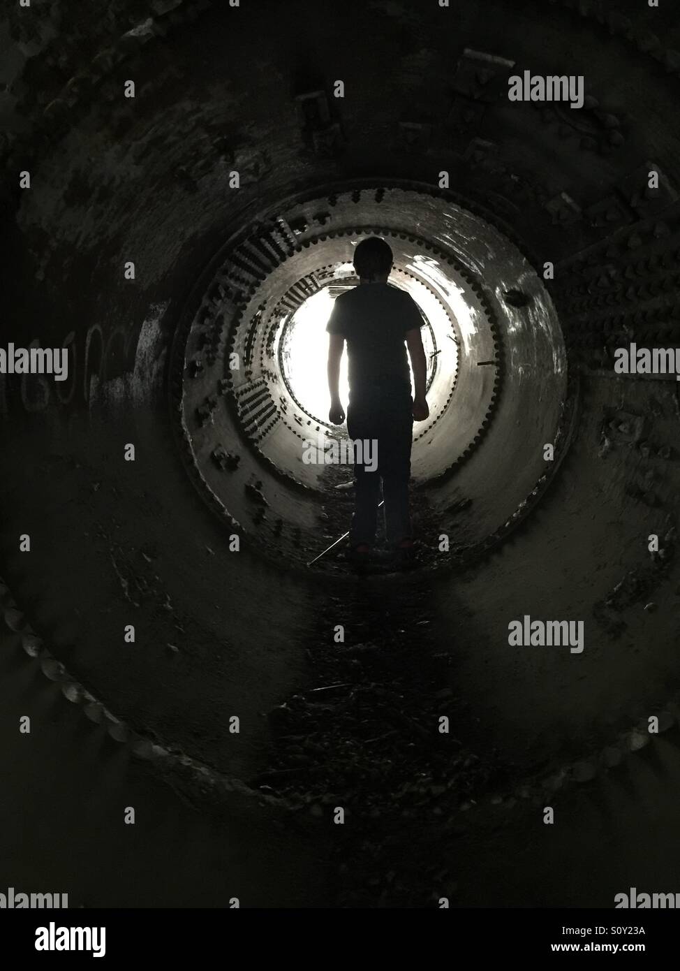 Boy in a tunnel Stock Photo Alamy