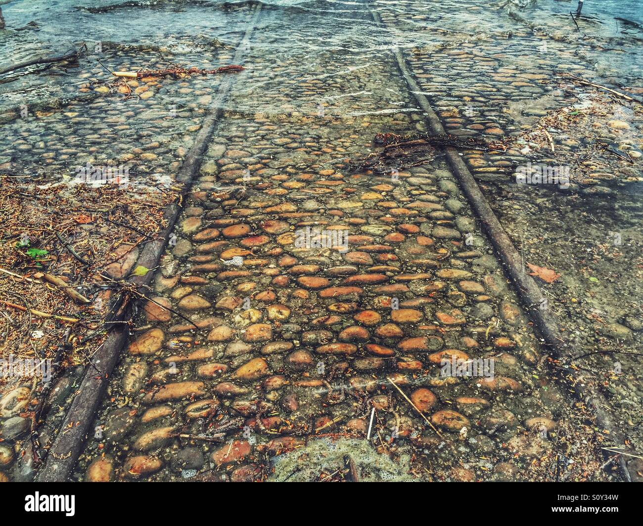 Railway tracks in the water - Smartphone Captured Stock Image