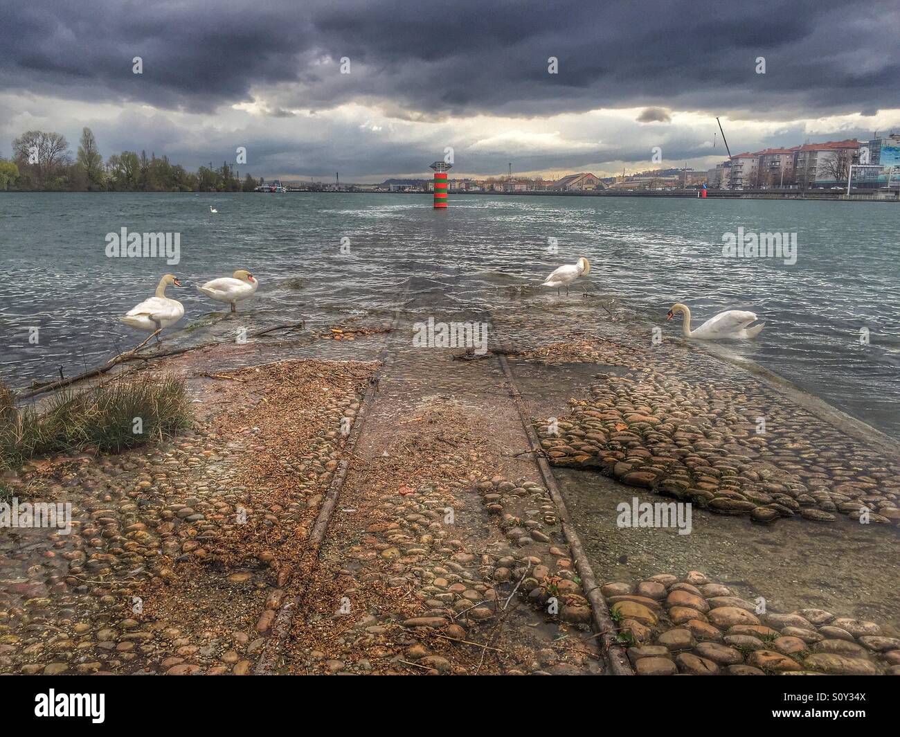 Rail tracks going under water - Smartphone Captured Stock Image