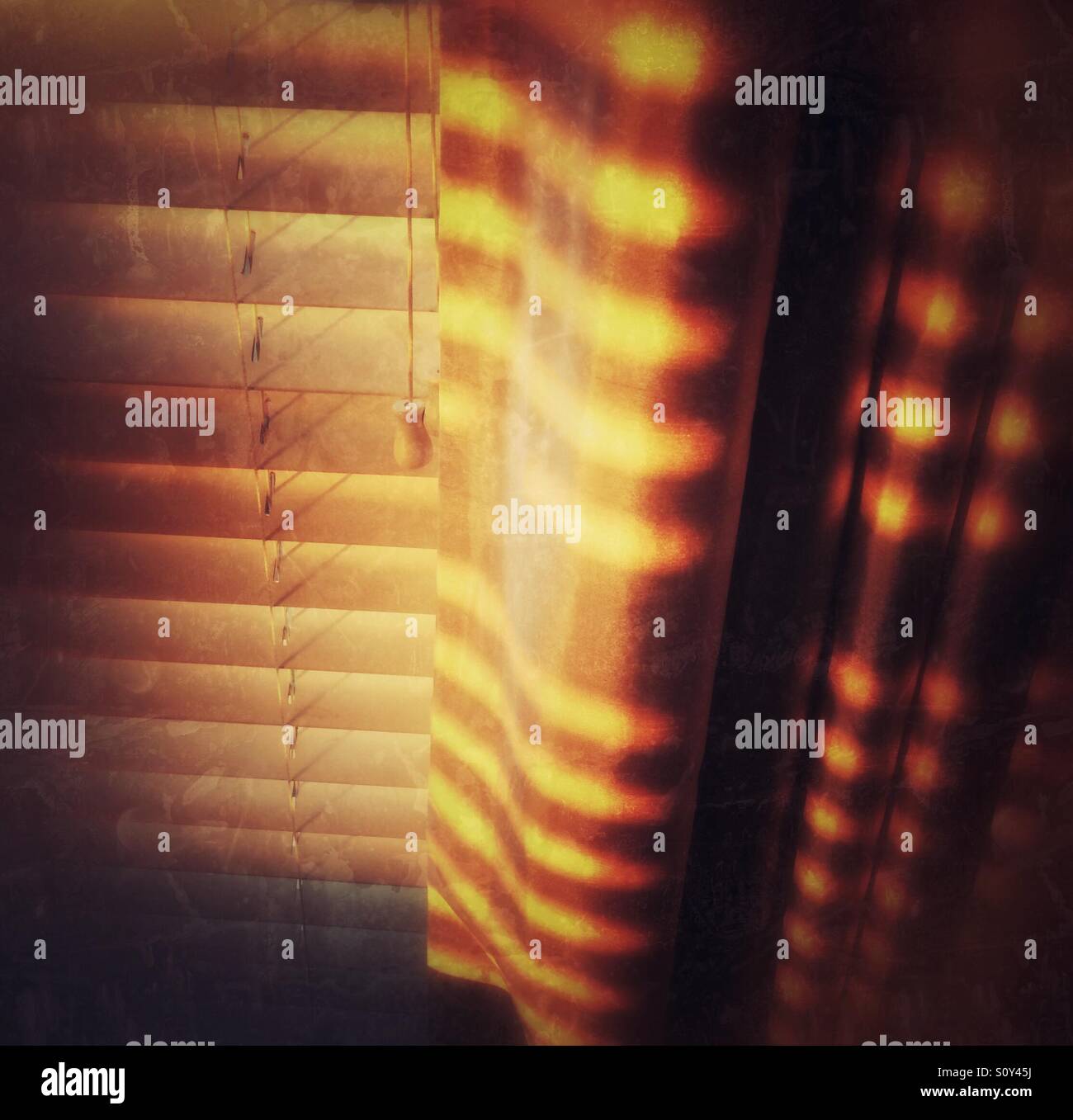 Sunlight and shadows on a set of blinds and curtains - Smartphone Captured Stock Image