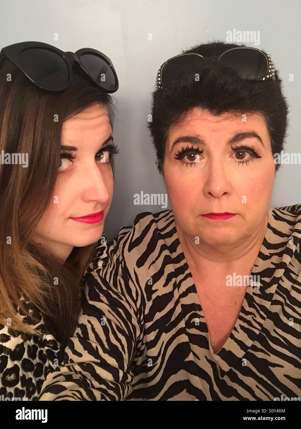 A mother and daughter wearing leopard and zebra patterned clothing and ...