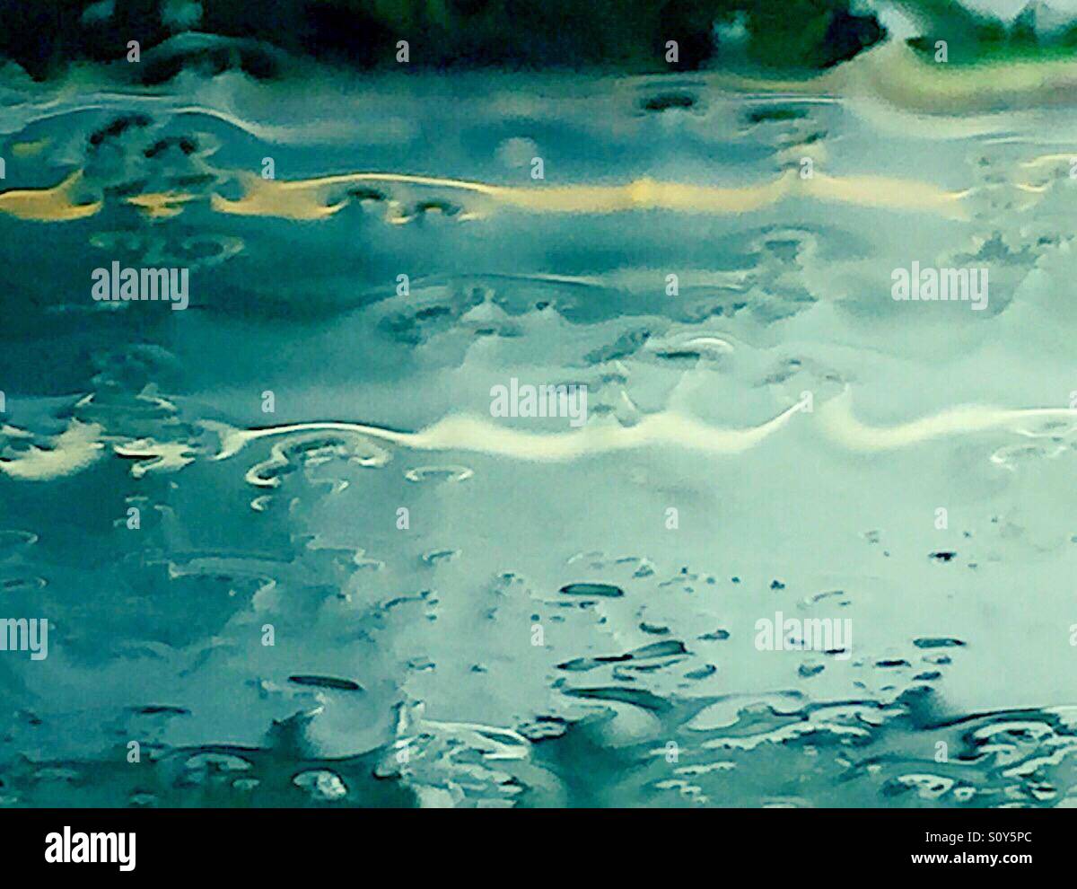 Street through wet windshield Stock Photo Alamy