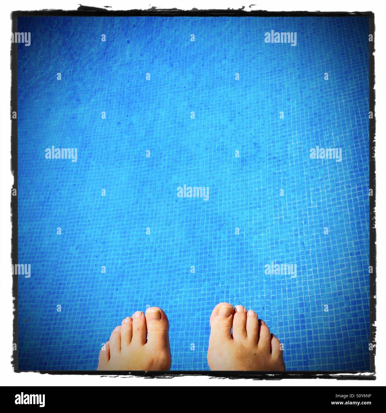 Feet & pool Stock Photo