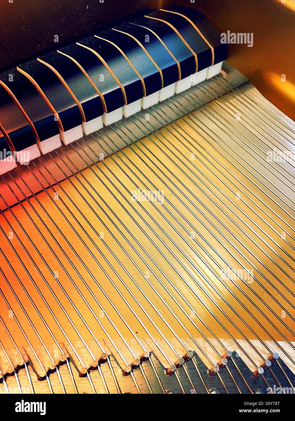 Grand piano strings and hammers - Smartphone Captured Stock Image