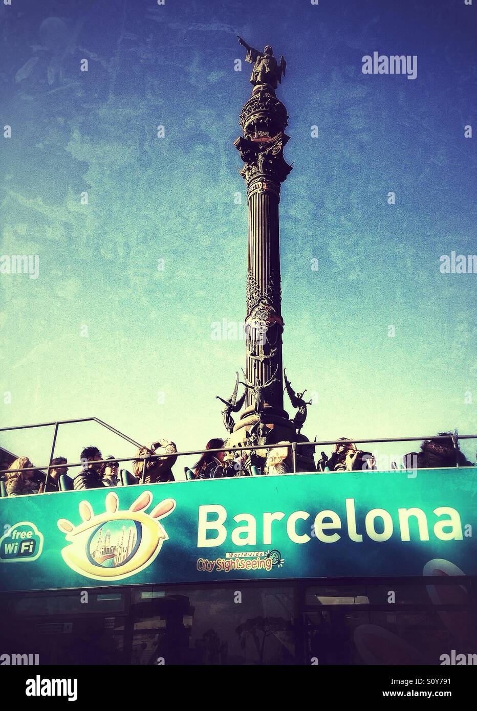 Tourist bus in Barcelona near Columbus monument - Smartphone Captured Stock Image