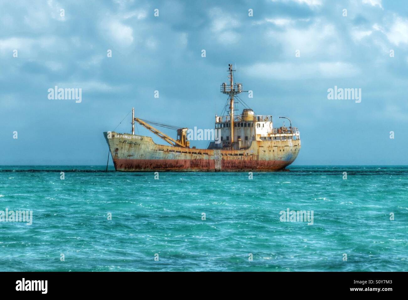 La Famille Express shipwreck anchored off the southern waters of Provo in the Turks and Caicos Islands. Stock Photo