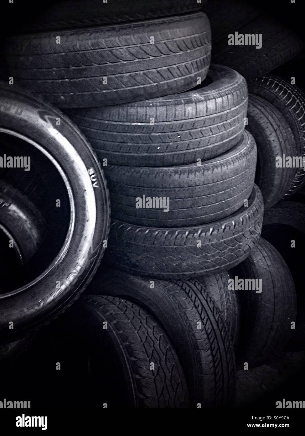 A stack of used automobile tires - Smartphone Captured Stock Image