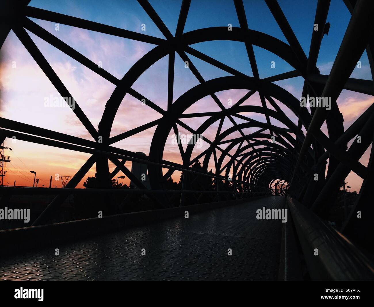 Dynamic Bridge in colourful sunrise Stock Photo