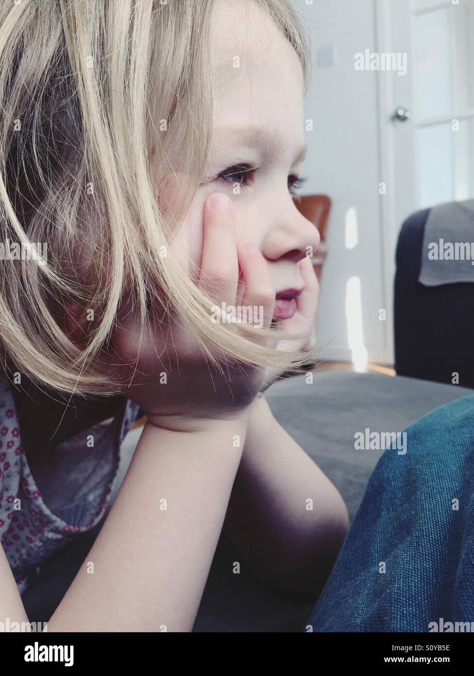 Watching iPad - Smartphone Captured Stock Image