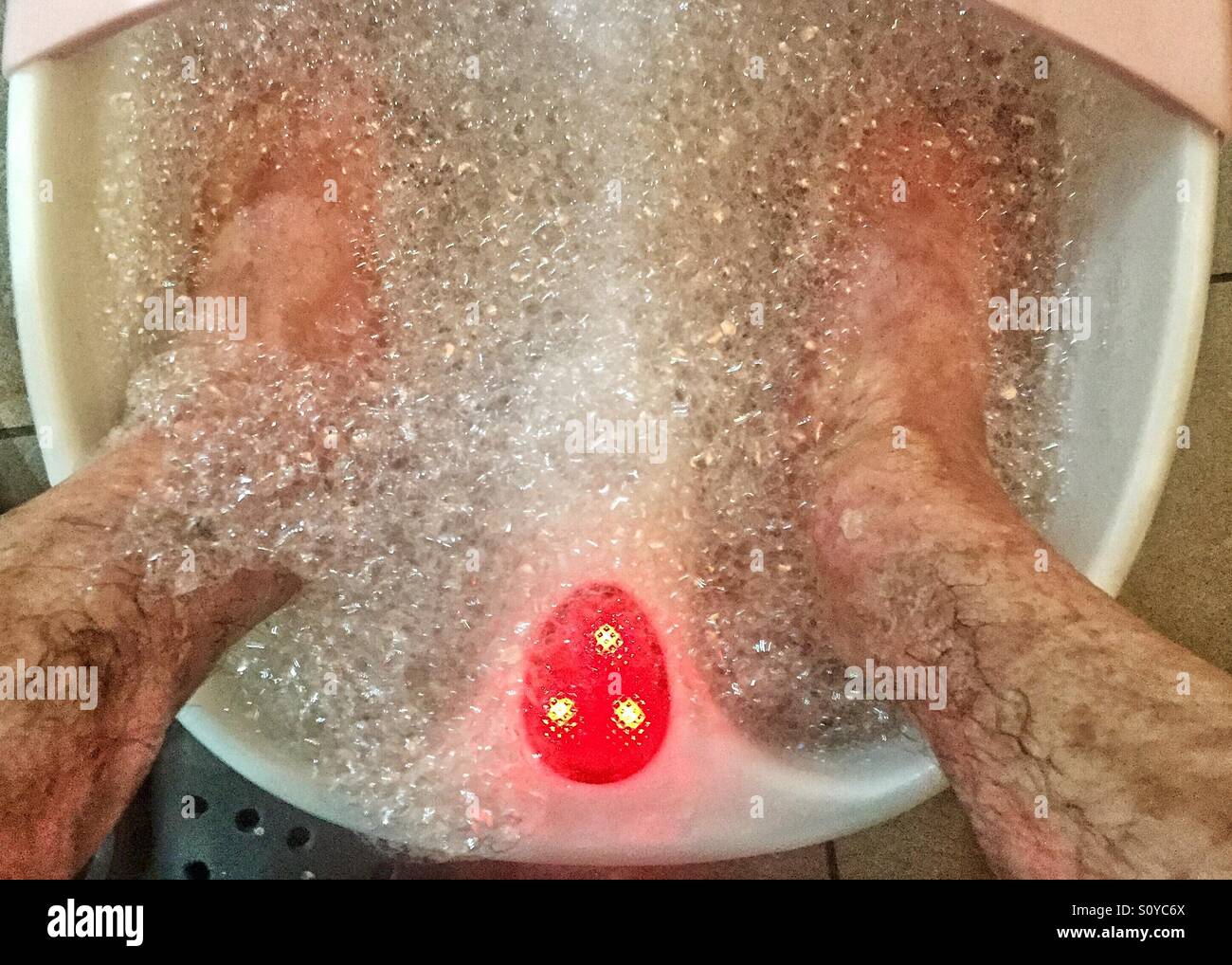 Male pedicure bath Stock Photo