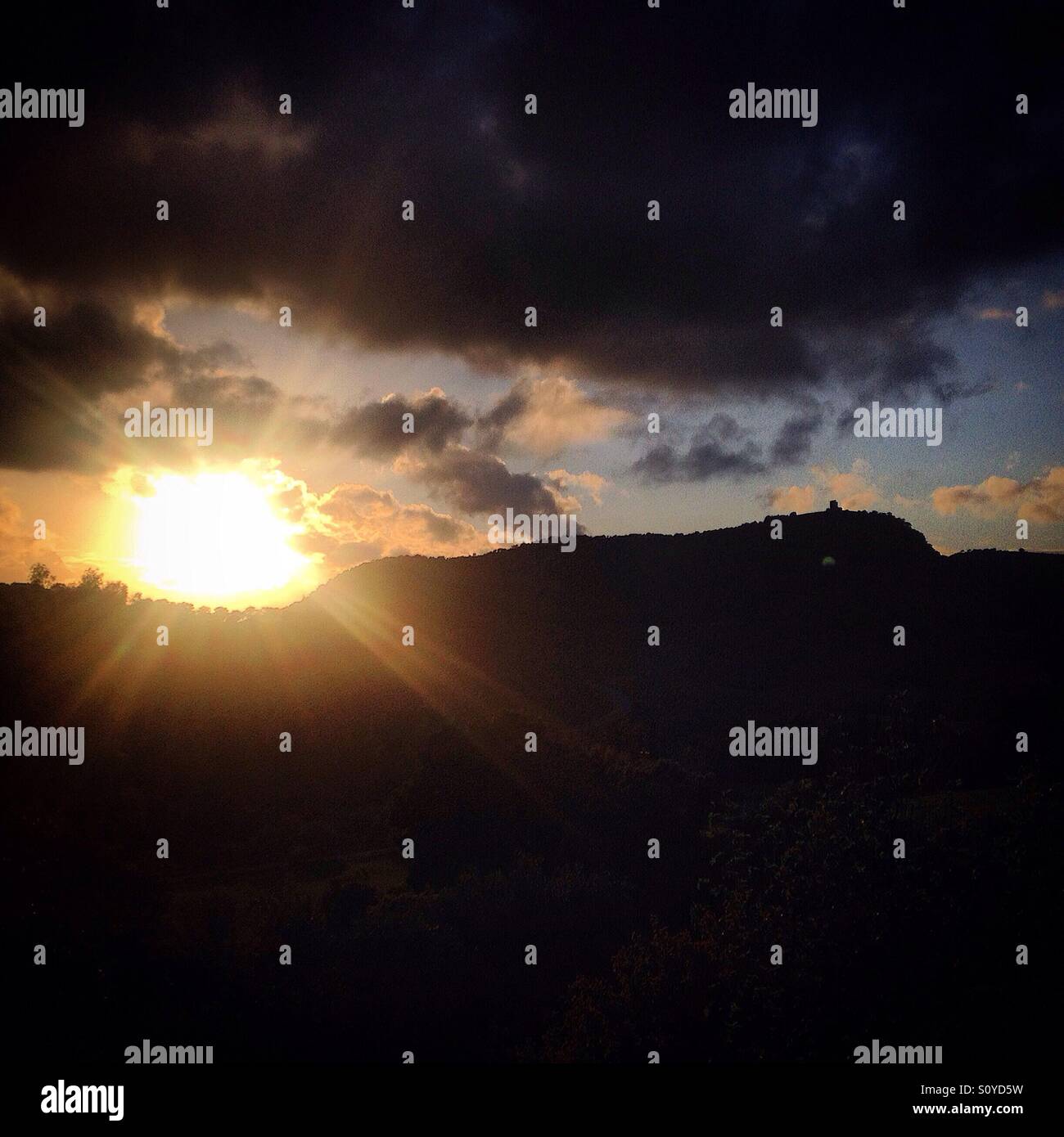 Sunset over Torre Pajarete castle in Prado del Rey, Sierra de Cadiz, Andalusia, Spain - Smartphone Captured Stock Image