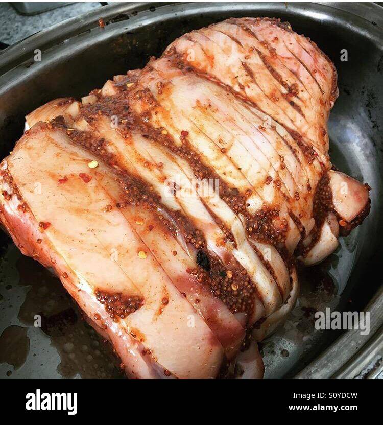 Gammon joint ready for slow roasting Stock Photo Alamy