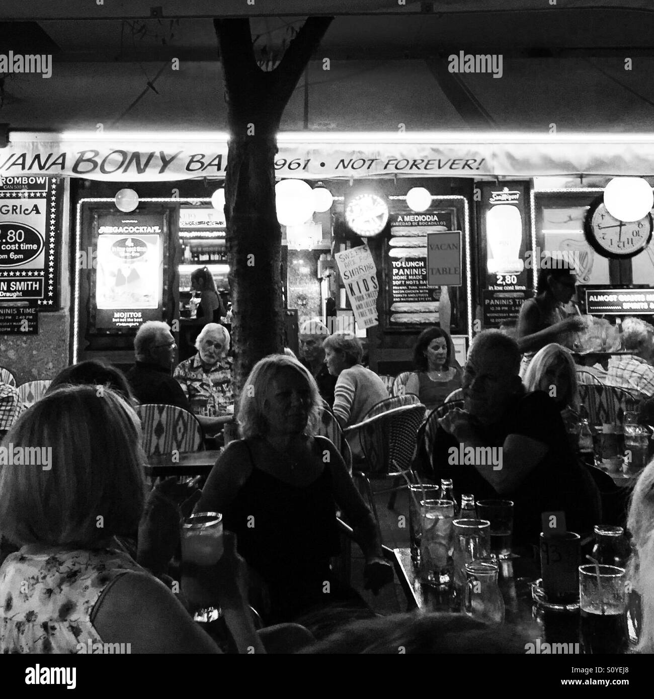 Busy Mallorcan bar on a summers night Stock Photo