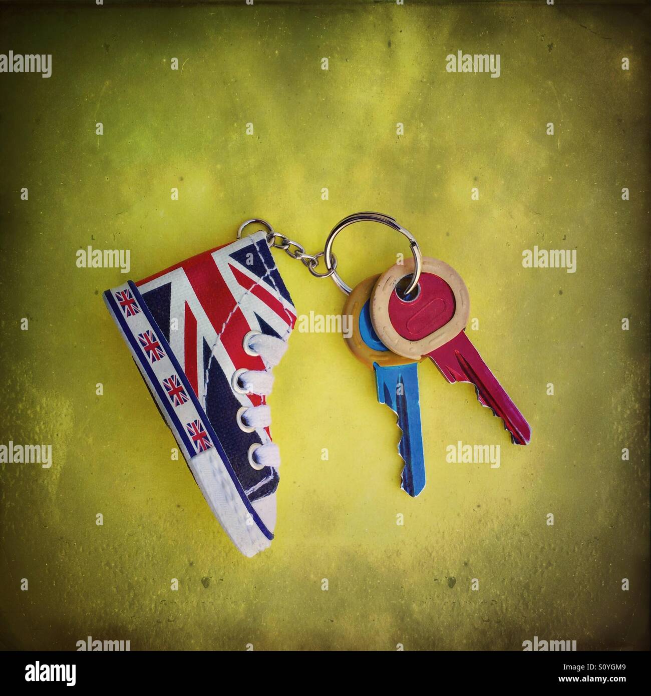 Union Jack Sneaker keychain with colorful set of keys - Smartphone Captured Stock Image