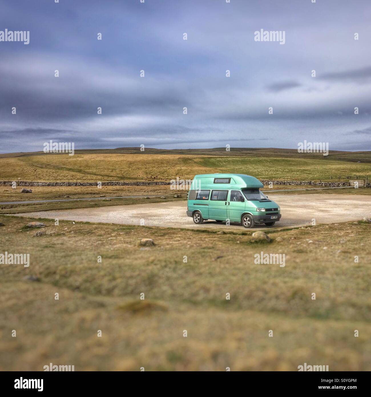 VW camper van alone on the North Yorkshire moors - Smartphone Captured Stock Image