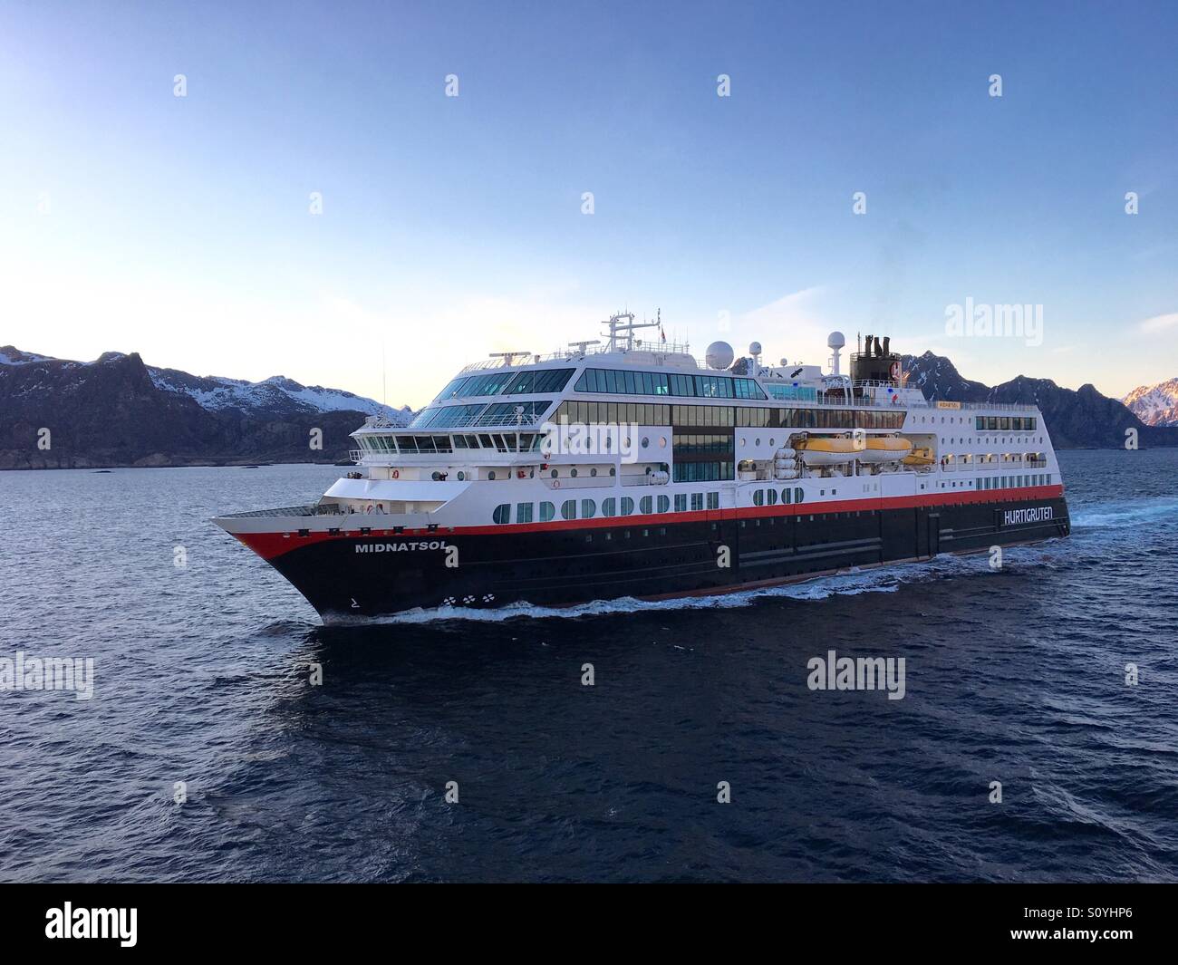 The Norwegian Coastal Express(Hurtigruten)-ship 'MS Midnattsol' in Lofoten, Norway. Stock Photo