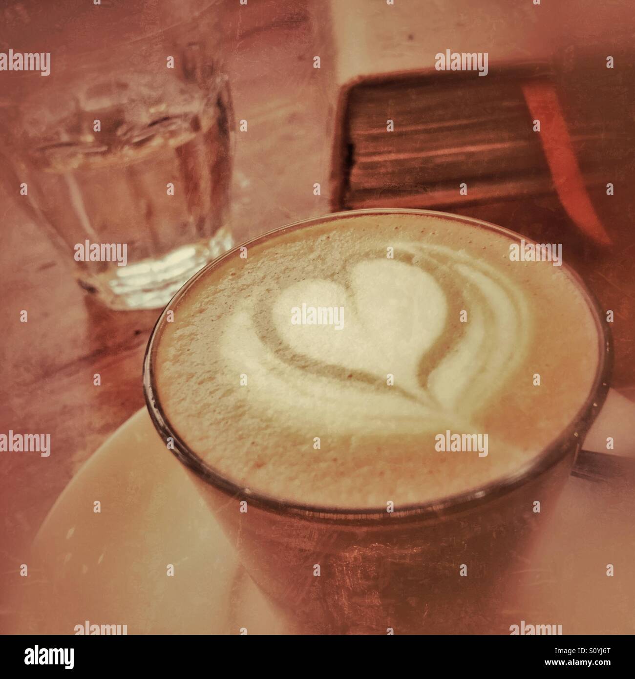 Morning cup and reading - Smartphone Captured Stock Image