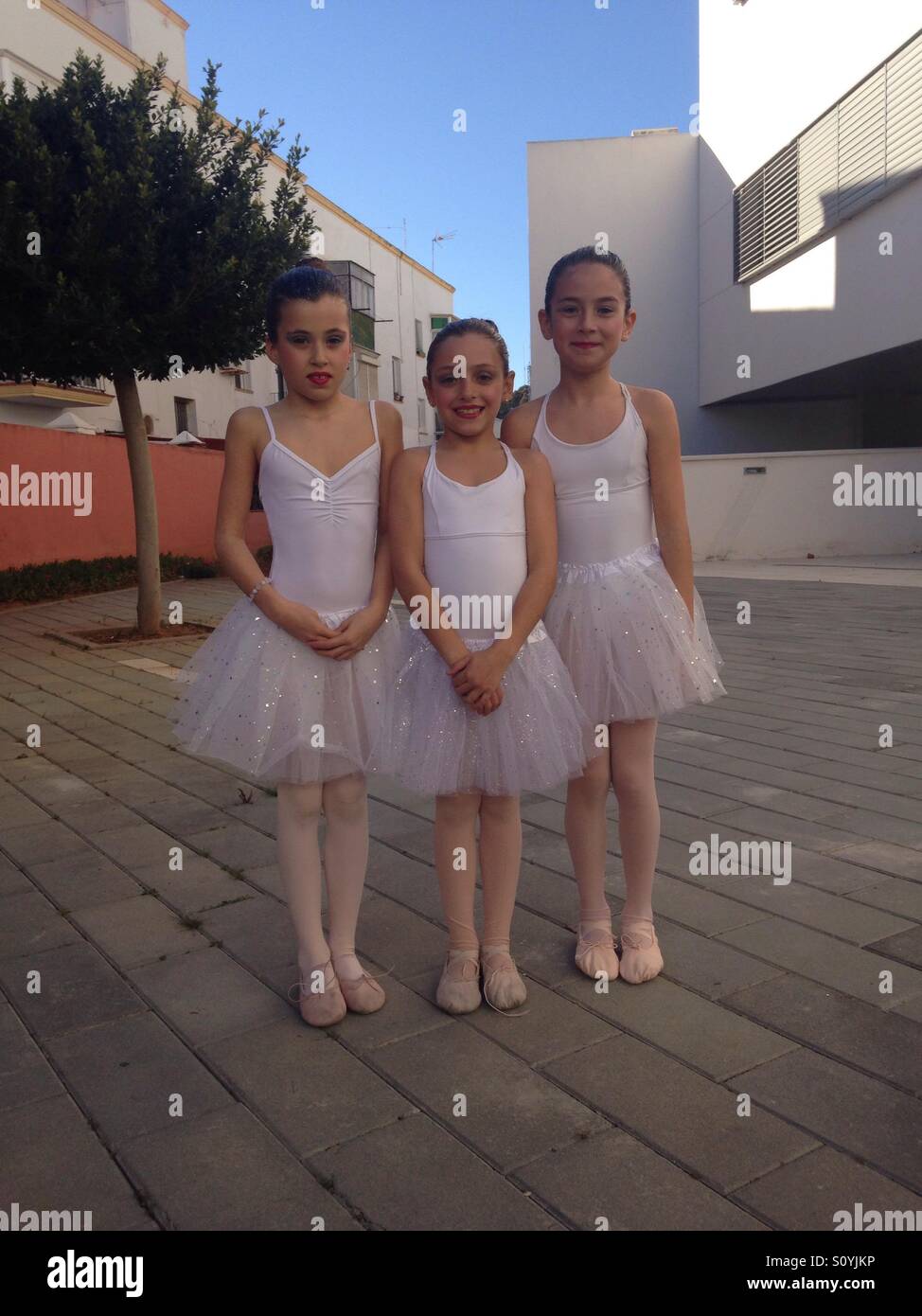 Ballerina white tutu girls children happy show Stock Photo