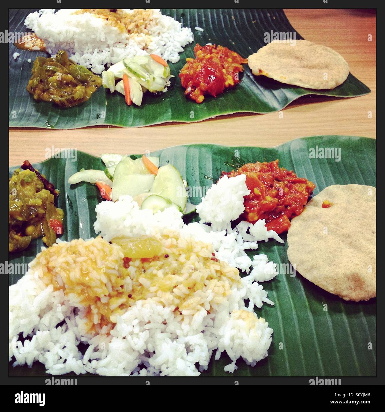 Indian food served on banana leaves Stock Photo Alamy
