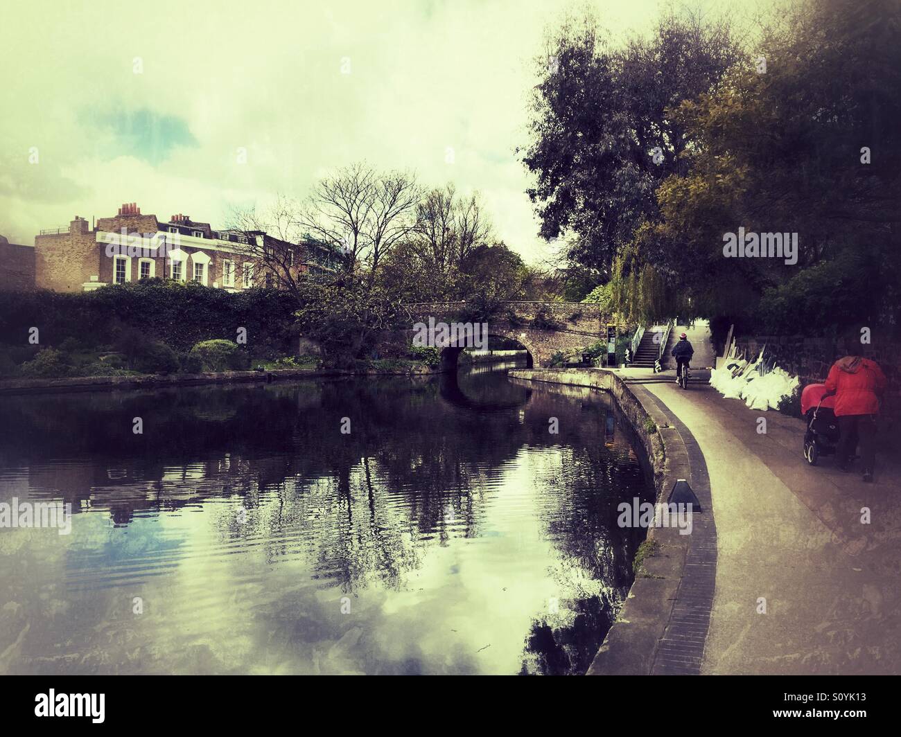 Wharf road towpath and bridge on Regent's Canal, Islington, London on a spring morning - Smartphone Captured Stock Image