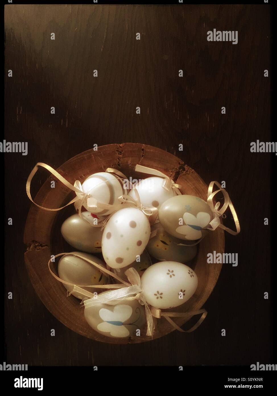 Ornamental eggs in a wooden bowl - Smartphone Captured Stock Image