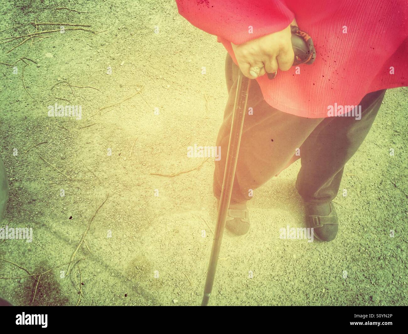 Old woman walking stick hi-res stock photography and images - Alamy