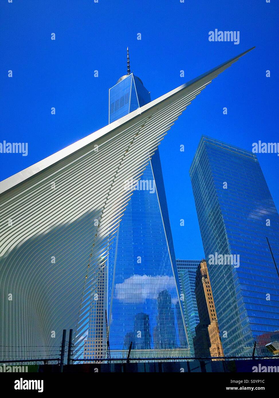 The transportation hub wing like architecture and freedom Tower at the world trade center site, NYC - Smartphone Captured Stock Image