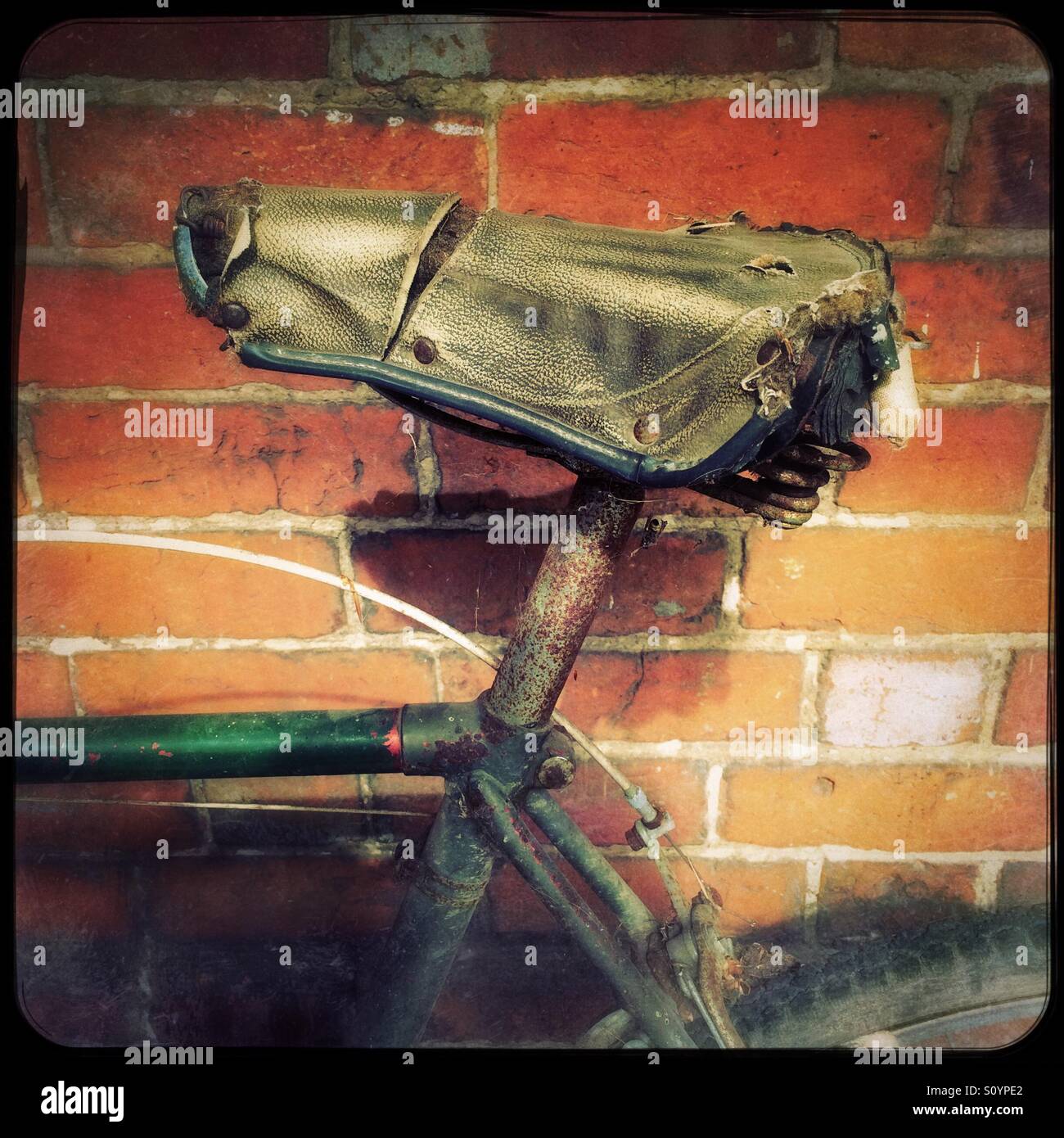 Old bicycle saddle Stock Photo
