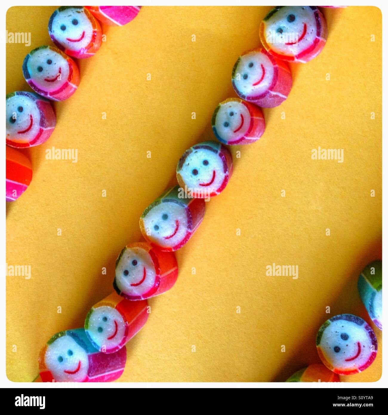 Lines of Smiling faces - Smartphone Captured Stock Image