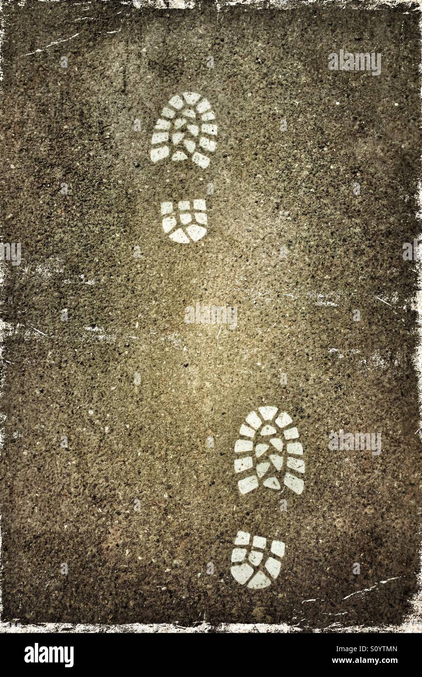 Painted boot print on asphalt - Smartphone Captured Stock Image