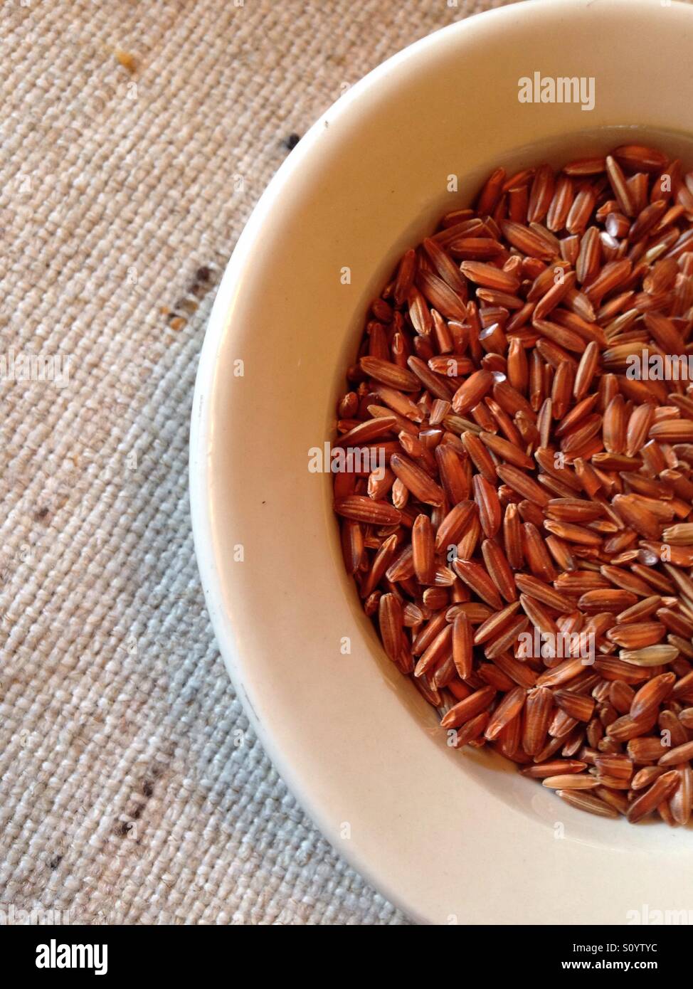 Bowl of whole grain rice Stock Photo Alamy