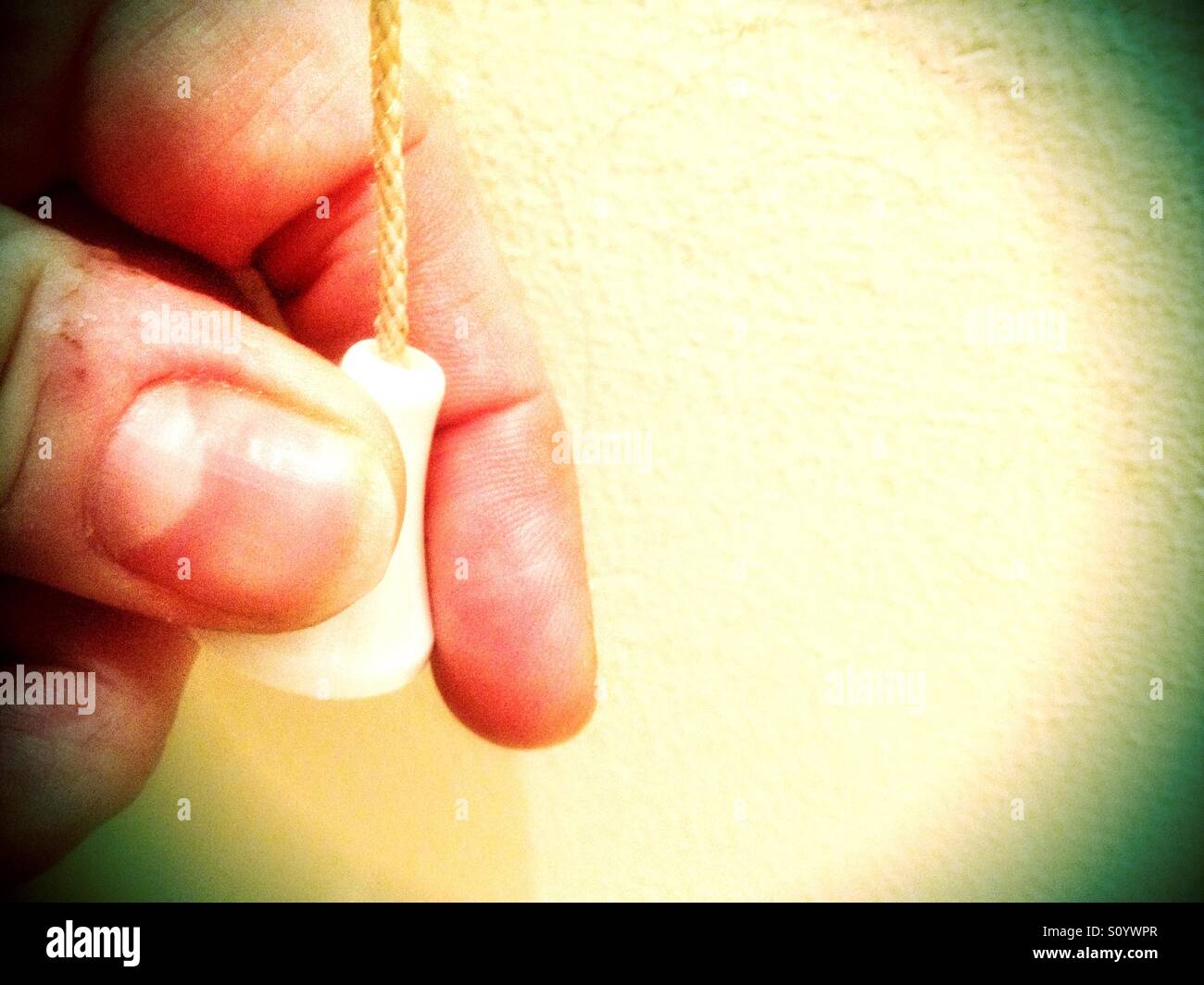 Turning the bathroom light off Stock Photo Alamy