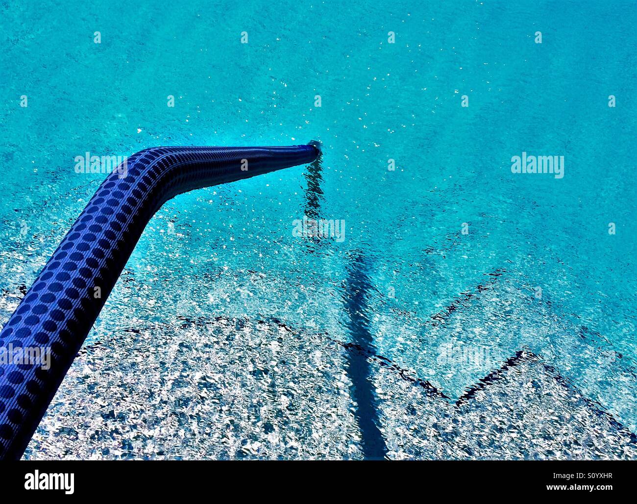 Pool rail and steps lead to a cool dip - Smartphone Captured Stock Image Pool rail and steps lead to a cool dip - Smartphone Captured Stock Image