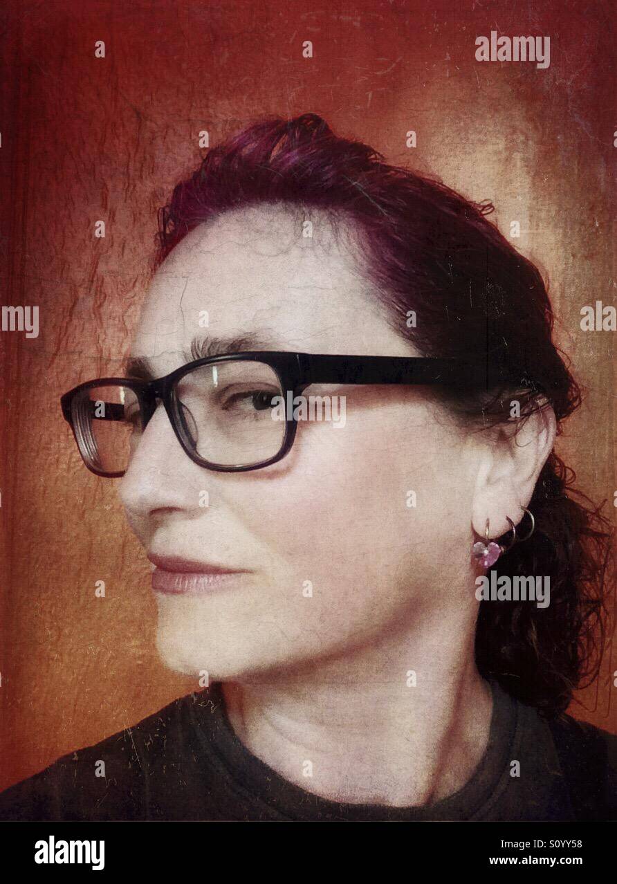 Middle aged woman wearing glasses in semi profile - Smartphone Captured Stock Image