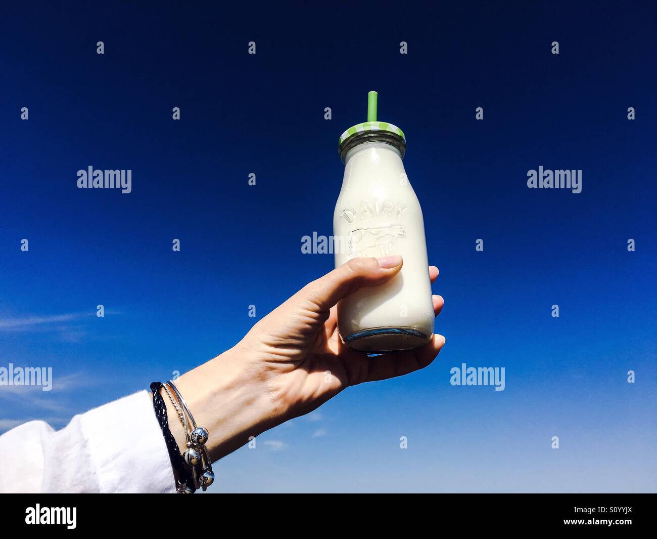 Milk and sky Stock Photo