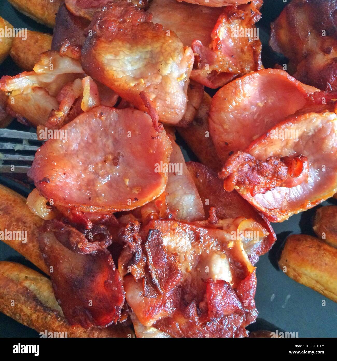 Processed meat - bacon and sausages - Smartphone Captured Stock Image