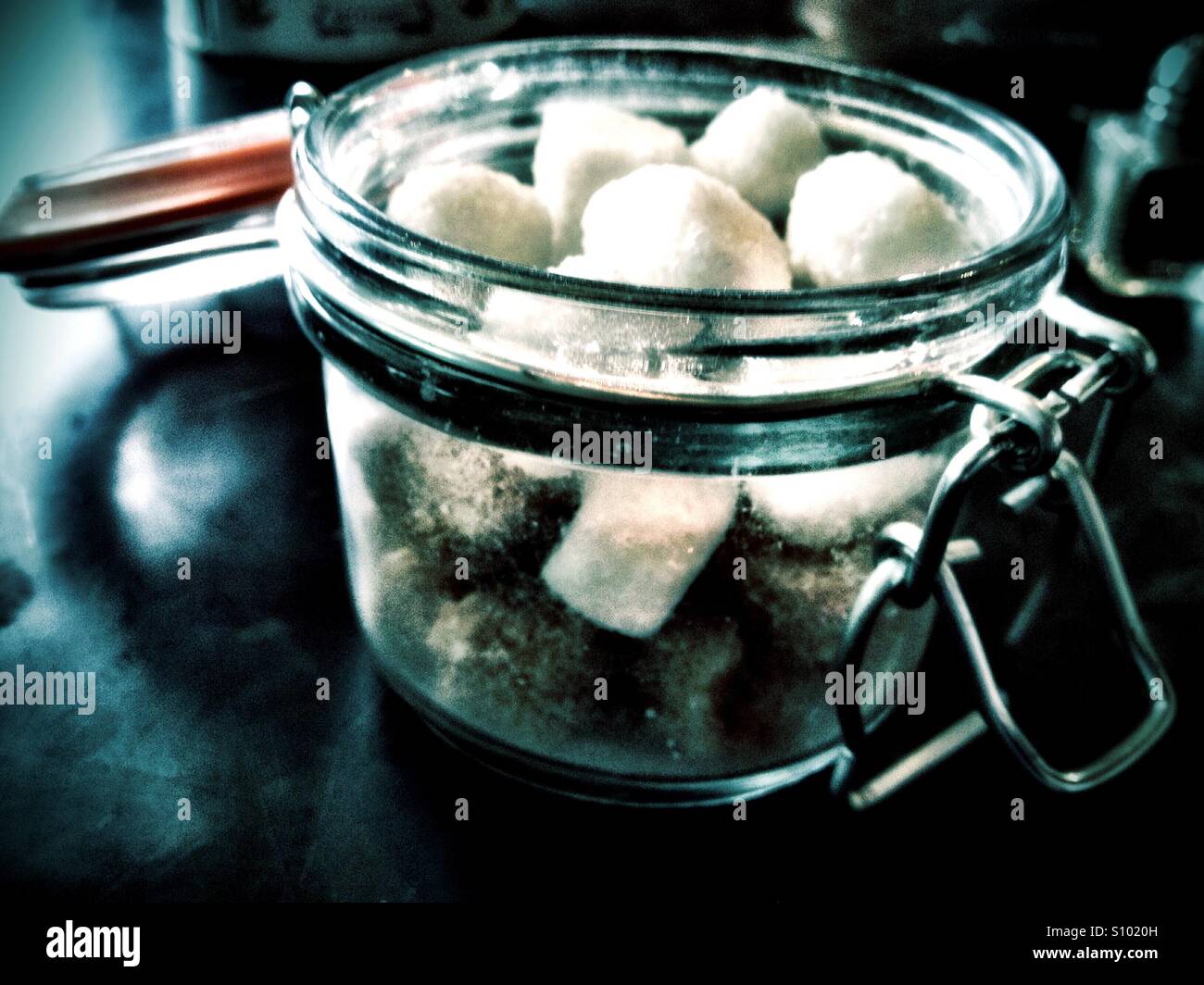 A jar of sugar lumps. Stock Photo