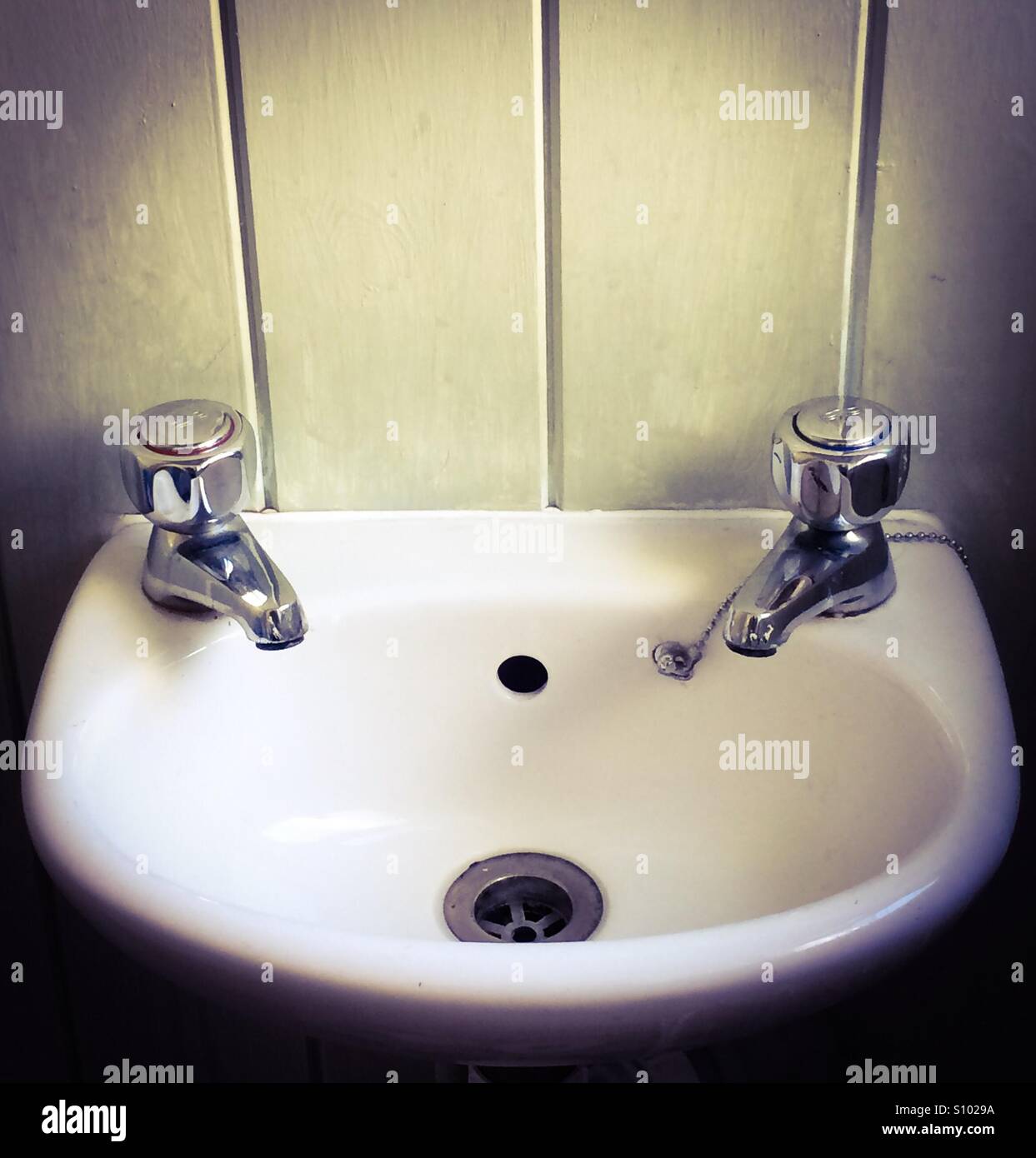 Bathroom sink and taps Stock Photo Alamy