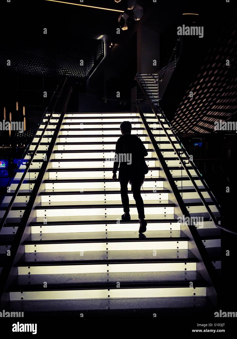 Up the white staircase. Concepts: moving up, step by step, mobility, upwardly mobile - Smartphone Captured Stock Image